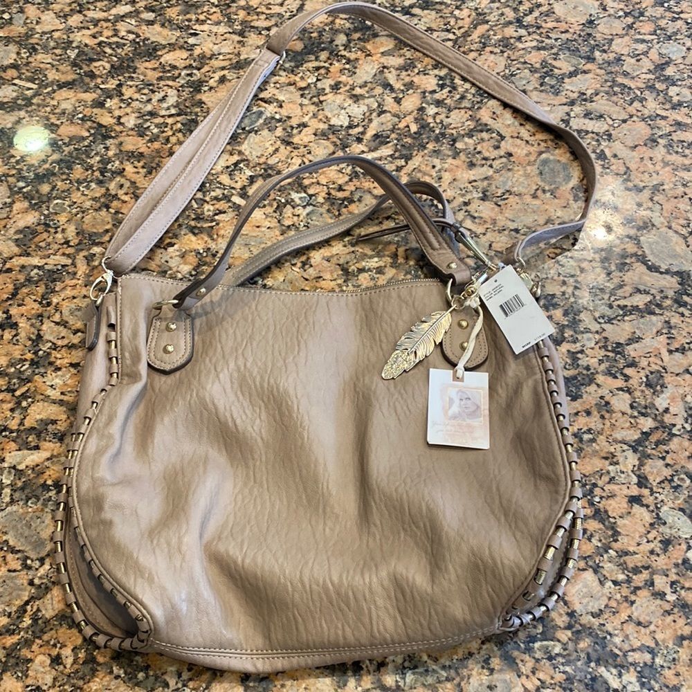 NWT Jessica Simpson Selena bag. Natural color. New bag with a small Blem.